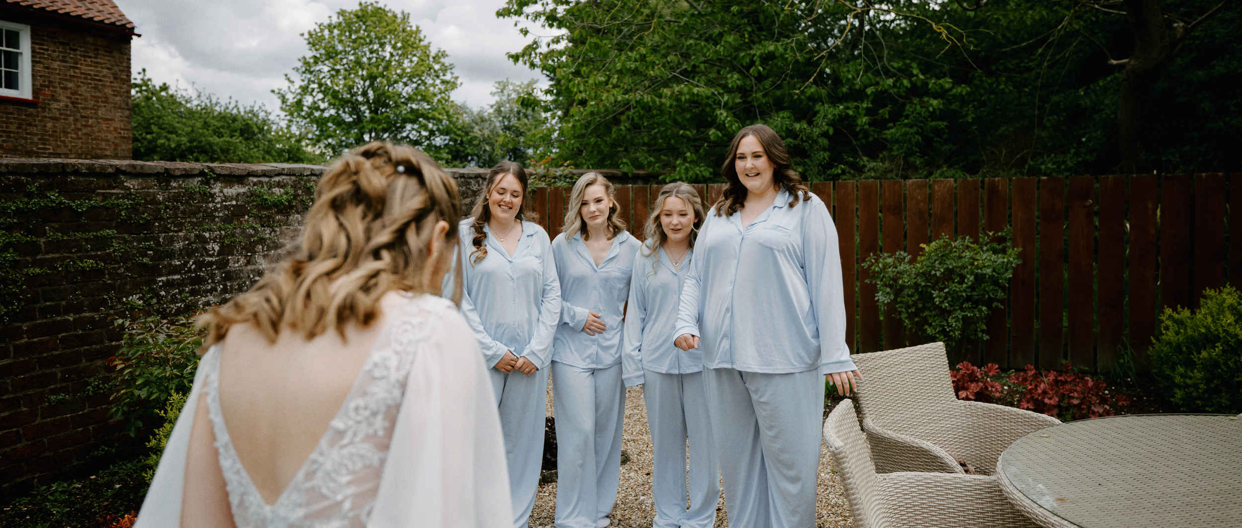 Bridesmaids first look in the grounds of Sledmere House