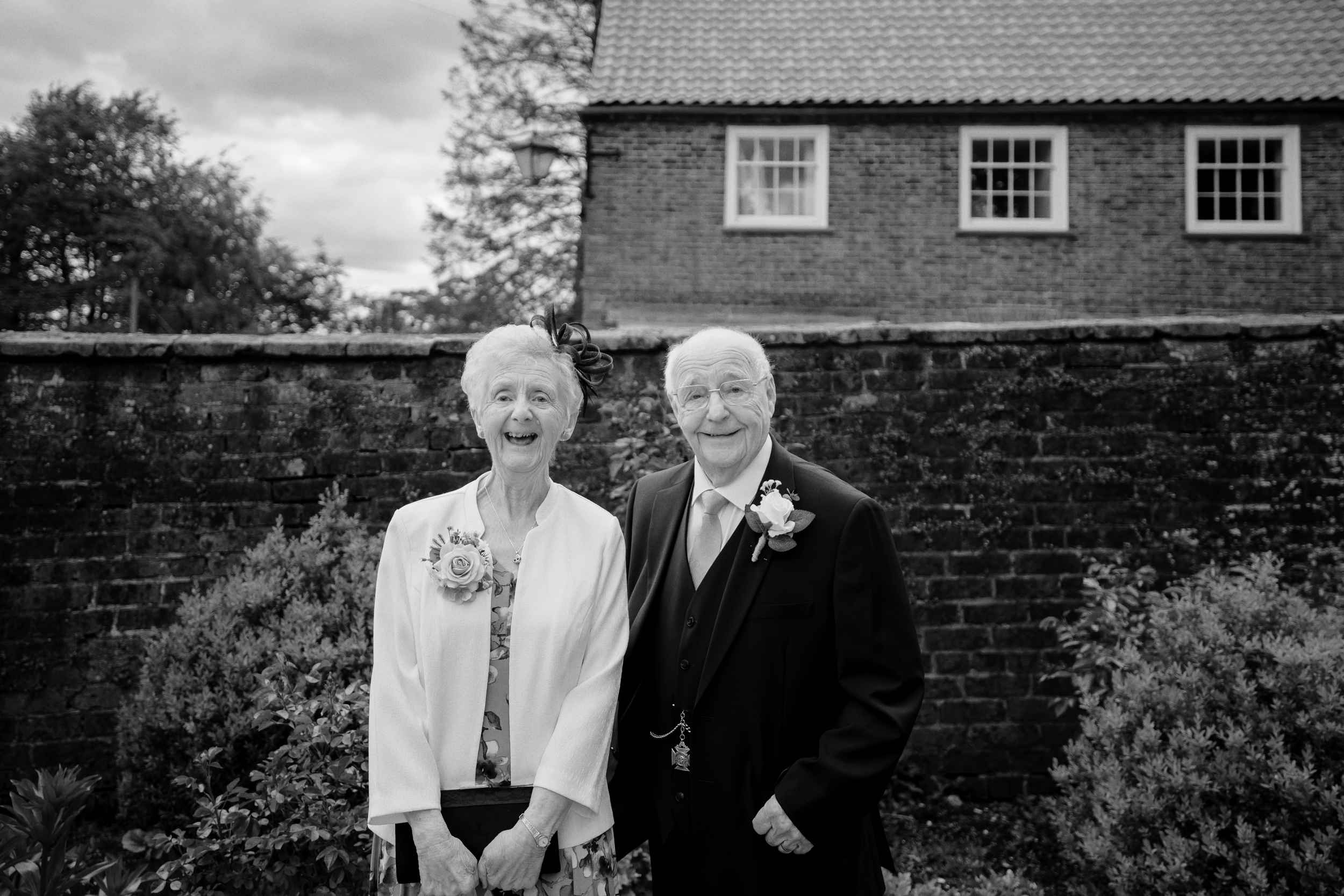 B&W Family photograph of grandparents before the wedding ceremony