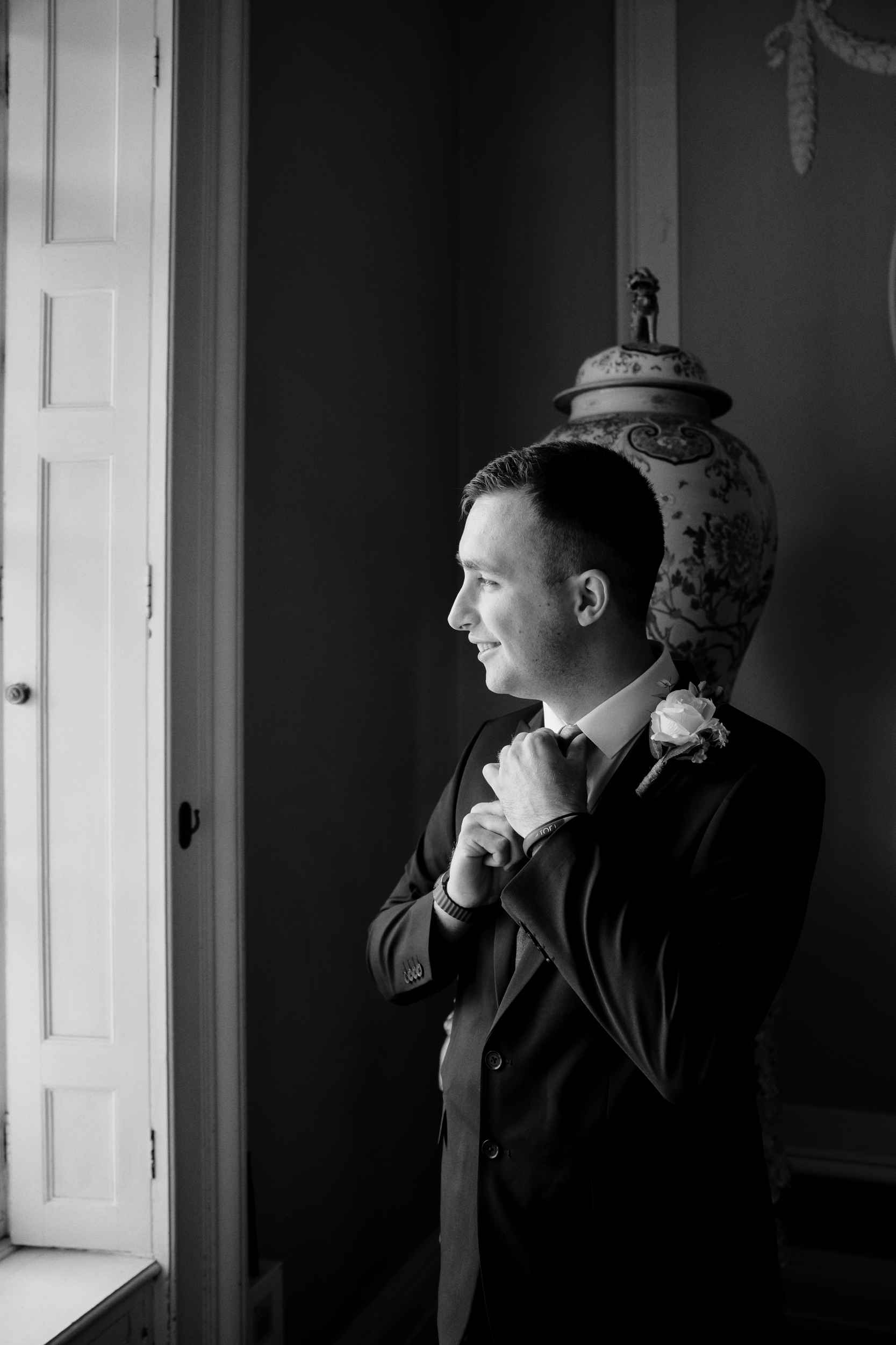B&W Editorial image of the groom before the wedding.