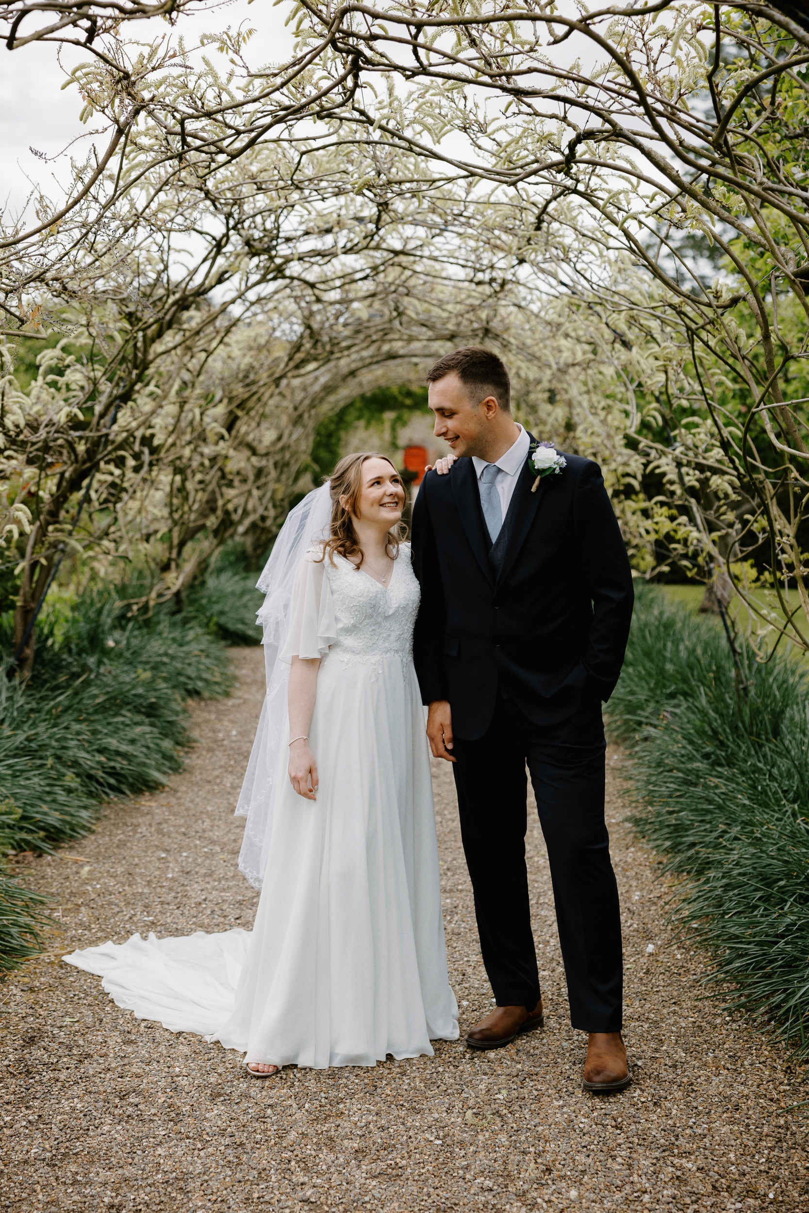 Couple portrait in the gardens of Sledmere House wedding venue.